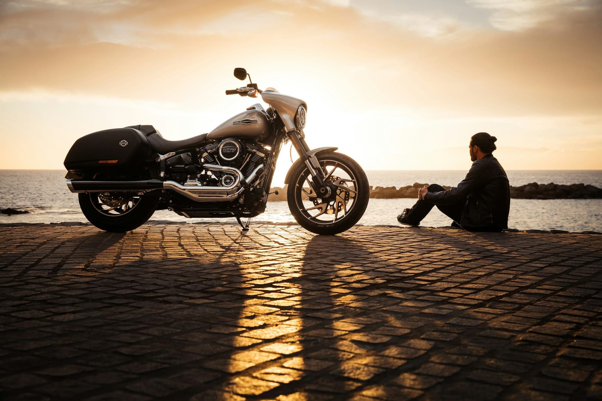 A Harley-Davidson motorcycle at sunset